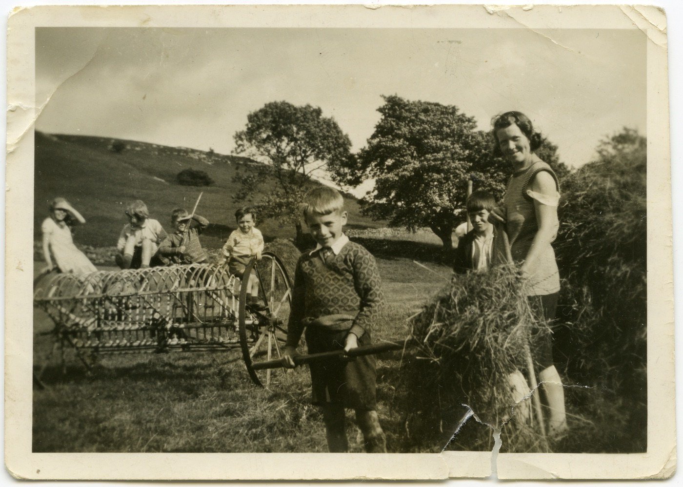 Coll. Enid Graham,  Alston. Copied with permission April 2012. 
The English family & others putting up hay pikes near Blagill ca 1933. Enid was born at Blagill, where her father farmed, in 1935.
L>R Nancy English (ca 11yrs), ?,? Arnold English, (ca 4yrs).
Foreground 2 unidentified boys and Enid's Mam, Florence English>Lamb.