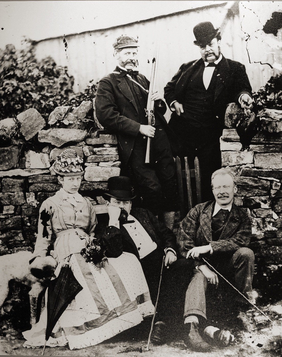 Coll. AMHS from the Now and Then exhibition ca 1985. Prints courtesy Noel Faulkener from the Don Middleton collection.
This image is one of 2 from the day. The other is seen in carte de visite size, is associated with von Dix images (1869; in Alston), and shows the keeper alone in the same gateway.
The bowler hatted man look well satisfied with life though the woman isn't letting too much emotion hit the lens.