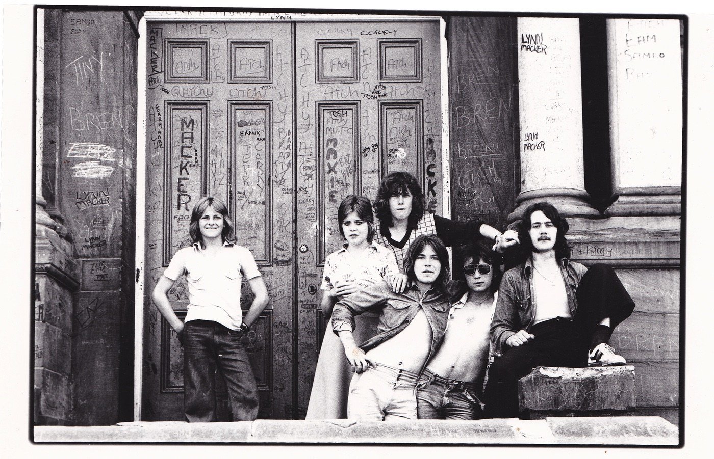 Community Development Project door. Youth from The Cellar.