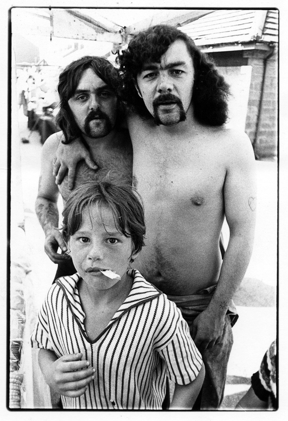 Thomas Dunn, Arthur 'Paki' aka 'The Mexican', Dunn, Carl Salmon at the front. A sunny Market Day in 1975.
