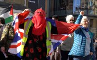 My friend Taj Khan- celebrating her right to cover her face- and to wear the Union Flag! Ban the Burka Day, Newcastle.